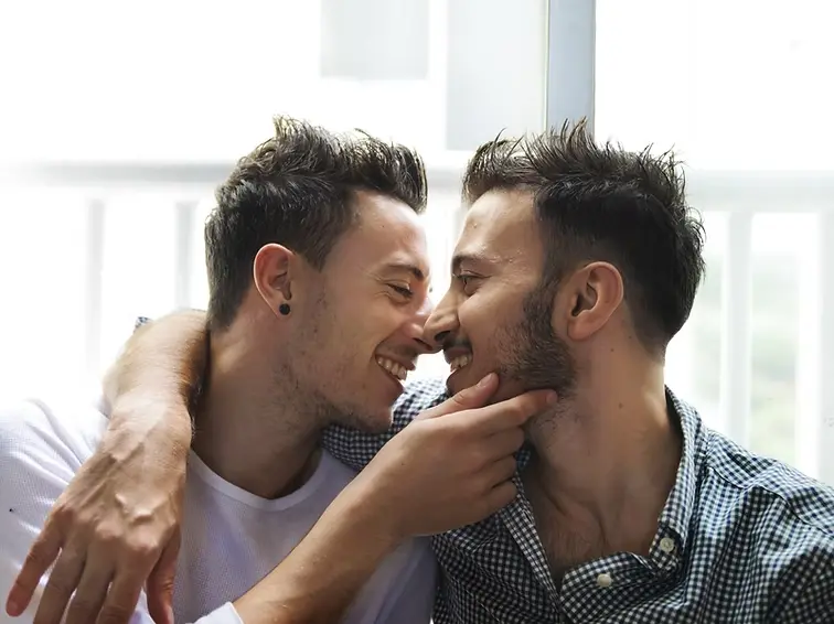 gay couple sharing intimate moment representing couples therapy and relationship support