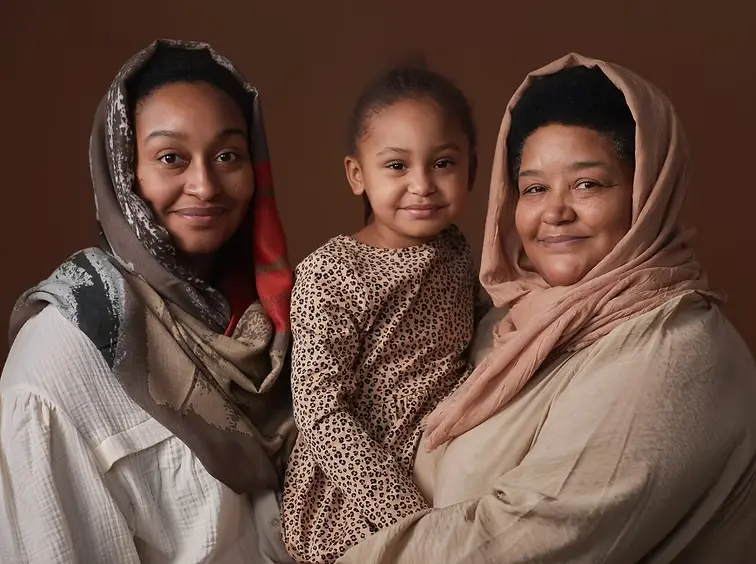 Multi-generational family portrait representing generational trauma healing and cultural connection